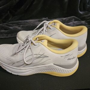 Dansko White and Yellow Athletic Shoes with Modern Design
